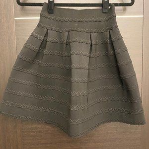 Pleasure Doing Business black pleated skirt